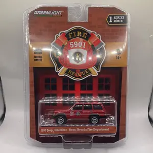 Greenlight 1990 Jeep Cherokee-Reno,Nevada Fire Department Diecast red