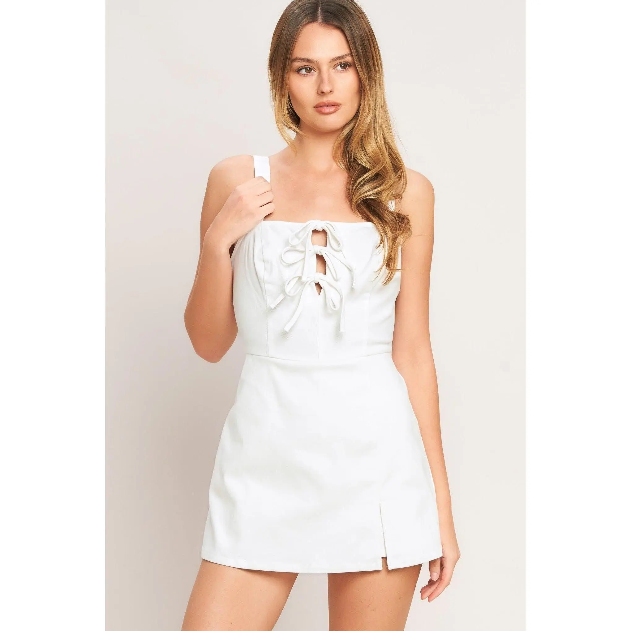 FIRST DATE WOVEN SKORT ROMPER