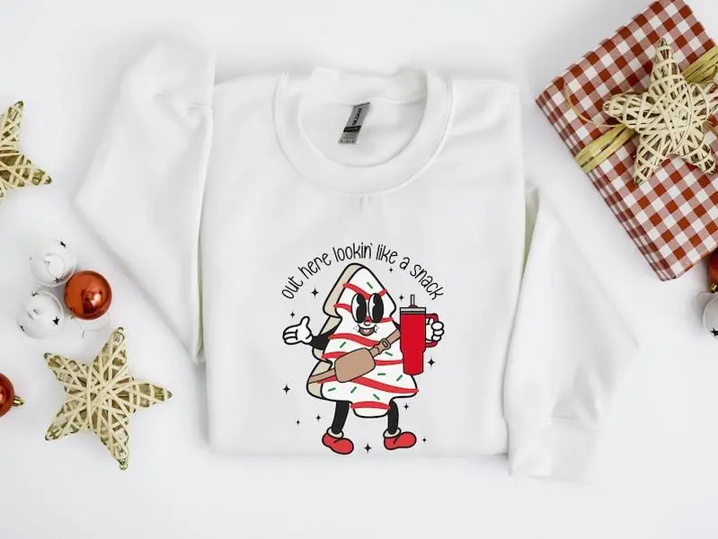 Funny Christmas shirt, Out Here Looking Like A Snack Cake Pullover, Tacky Christmas Sweatshirt, Gift For Him, Unisex Christmas Sweatshirt, Gifts For Family Lovers, Long Sleeve Crewneck Shirt, Christmas Gift, Xmas Shirts, Gifts For Secret Santa