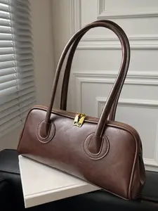 Ladies' with portable dual handle design, suitable for various occasions. The large capacity space can easily accommodate daily items, whether for commuting or leisure travel, with a simple and versatile design High Capacity Handbag