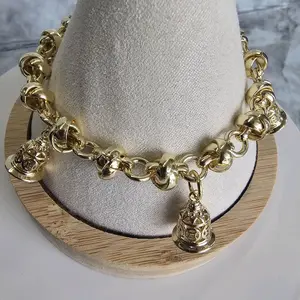 goldplated knotted bracelet with 5 bells-pulso con nudos laminado en oro con 5 campanas