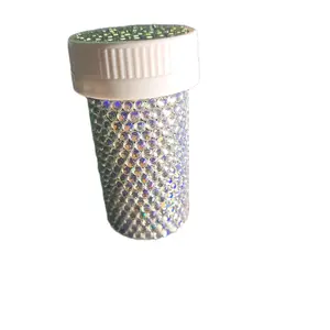 silver bedazzled pill bottle