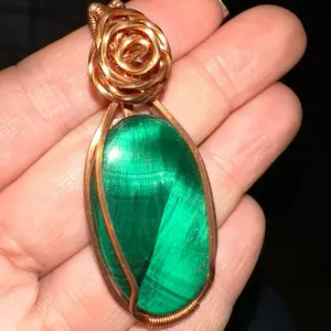 Wire Wrapped high quality Malachite Pendant Adorned with a copper rosette
