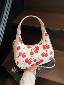 A niche retro fashion romantic cherry print crescent bag with exquisite atmosphere, featuring a multi back hand-held shoulder bag and a chain shoulder strap design, suitable for dates, parties, and shopping Crescent Handbag