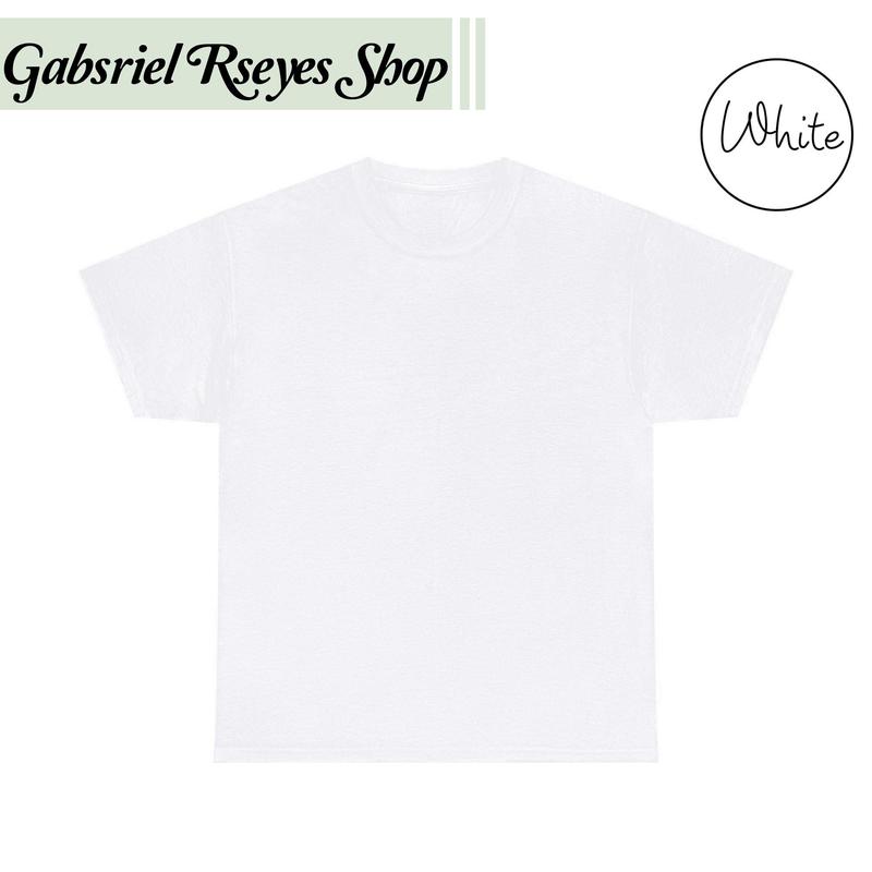 Rico o Muerto Victor Mendivil Graphic T-Shirt – Ojo de Horus Design with Bold Red and White Accents Premium Cotton Fabr Unisex Basic Cotton Tee