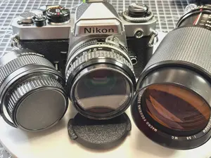 Nikon FE 35mm Film Camera w/Nikkor 50 mm Lens F2 and Vivitar 75-205 w/Doubler!