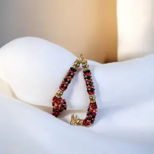 Elegua Orisha Ilde Santo Pulvera Guerrero Santeria Yoruba Ifa Bracelet with Red and Gold Beads 8 Inch Cultural Significance Spiritual Gift
