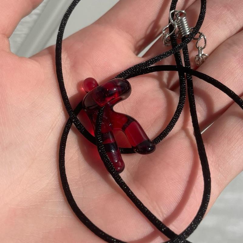 handmade glass “hangin’ in there” pendant