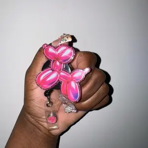 Balloon dog badge Reel