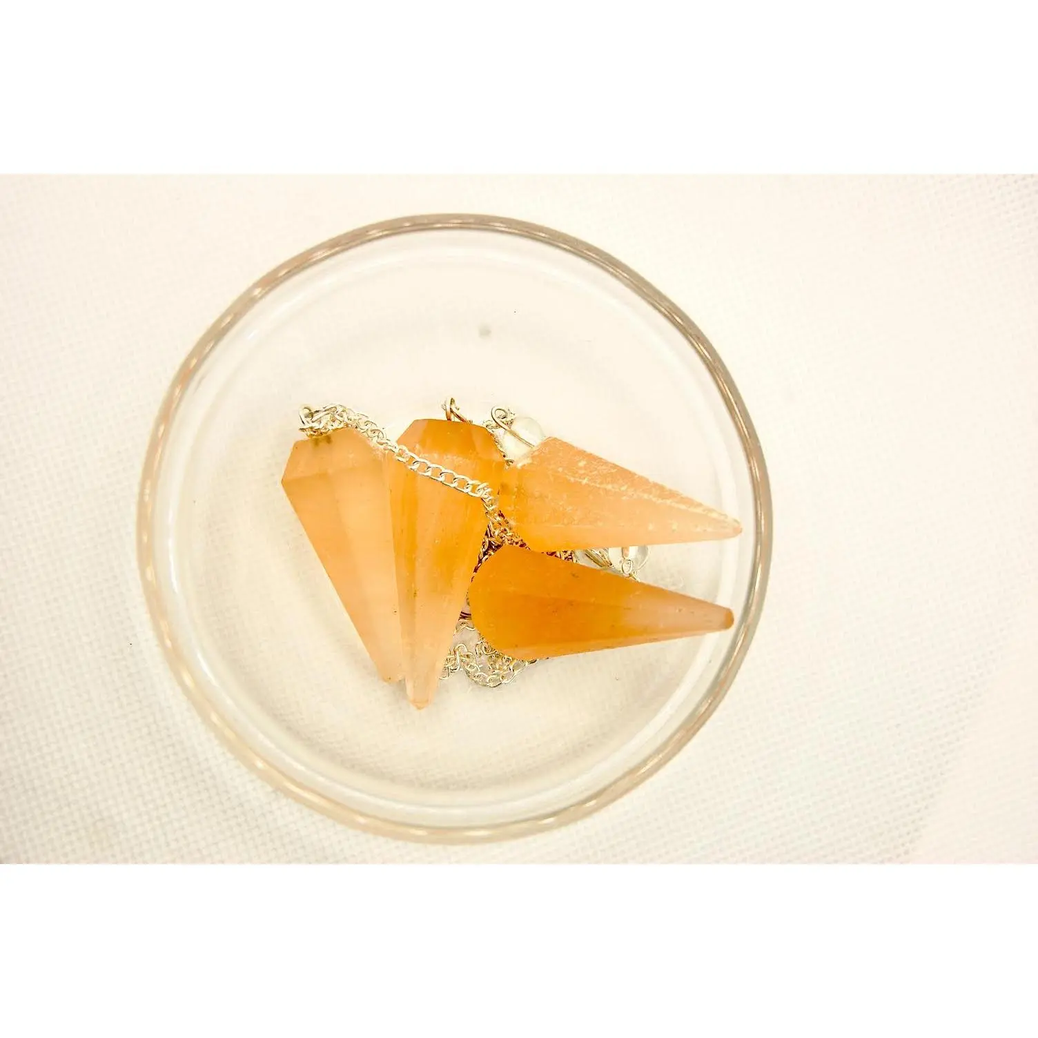 Orange selenite pendulum