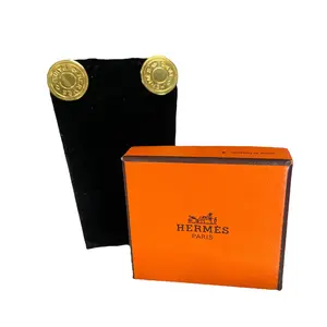 Pre-owned Hermes Paris Serie Medallion Gold Plated Metallic Clip On Earrings