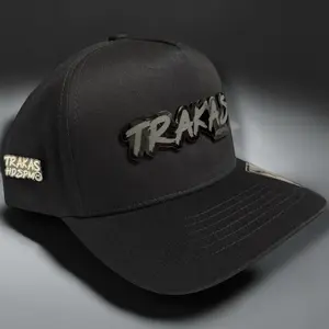 TRAKS Black Snapback Cap with Pin, Adjustable Snapback Design, Black Plaque, Comfortable Fit