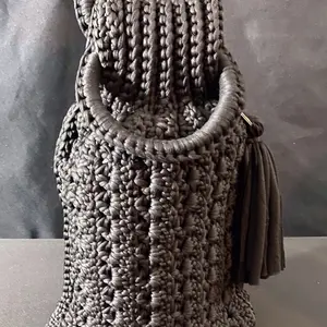 Handmade Black Crochet Purse with Tassel Detail and Circular Handle for Stylish Everyday Use