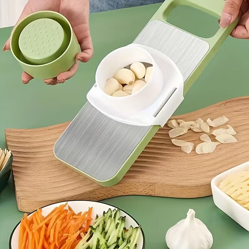 Multi-functional vegetable slicer with grater,adjustable stainless steel blades,comfortable handle,safety features,easy to clean,carrot grater,cabbage shredder,cucumber slicer, kitchen utensils
