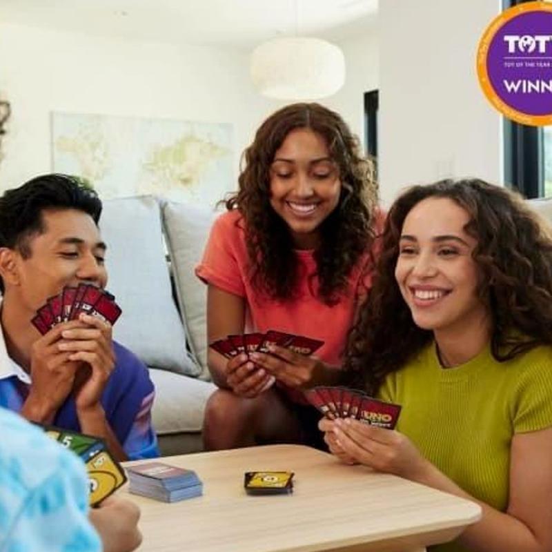 UNO Show ‘em No Mercy Plus Card Game in Storage & Travel Tin for Kids, Adults & Family Night with Extra Cards, Special Rules & Tougher Penalties