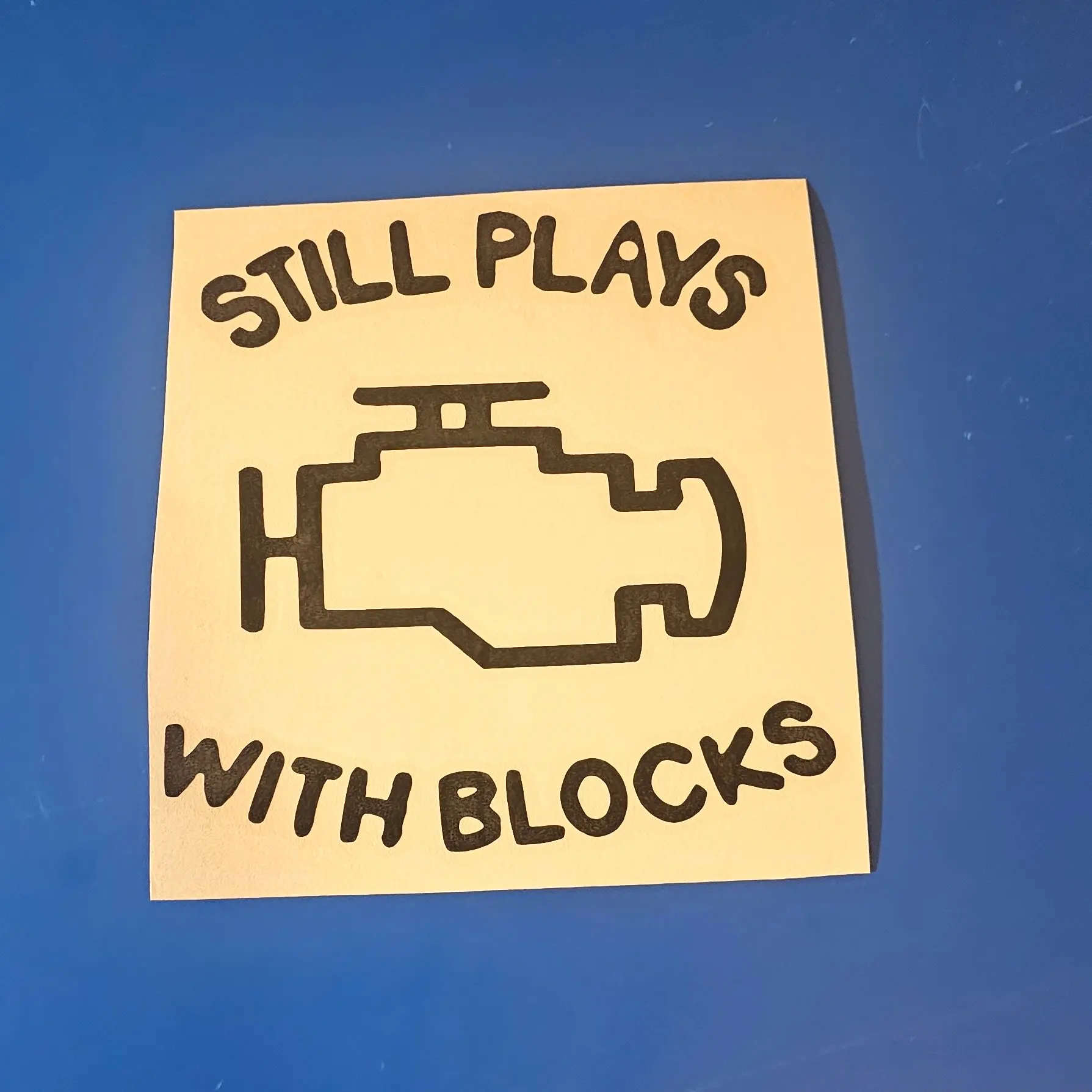 "STILL PLAYS WITH BLOCKS"  FUNNY MECHANIC VINYL DECAL 5 X 5 INCHES
