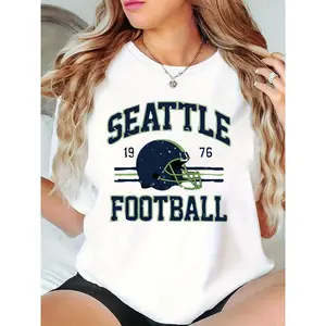 Women's Seattle Football Helmet Graphic T-Shirt | Game Day Casual Crew Neck Tee for Seattle Football Fans, Retro 1976 Design, White 100% Cotton T-shirt