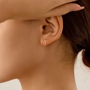 TASISO Golden Cross Earrings - Elegant Gold-Tone Hoop Design for Everyday Wear Stylish Accessory for Women Perfect for Any Outfit Versatile and Everyday Use