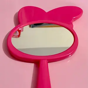 Pink Bunny Ear Handheld Mirror Compact Portable for Makeup Grooming Stylish Fun Design Ideal for On-the-Go Beauty
