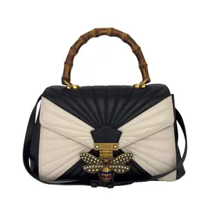 Pre-owned GUCCI Used Queen Margaret bag with bamboo handle, bee motif, crystal flap, shoulder/crossbody design