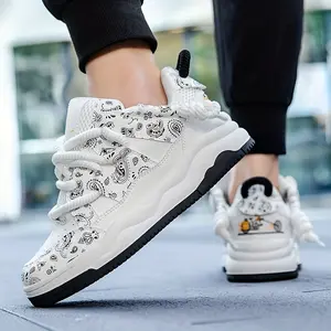 Men's Low Top Skateboarding Shoes with Houndstooth Pattern and Random Prints, Breathable PU Upper, Fabric Inner, Lace-Up Closure, Rubber Sole - Casual Skate Sneakers