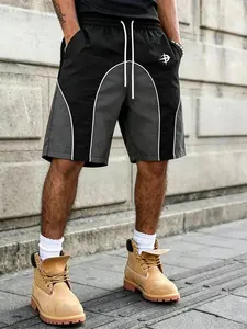 Men’s color-block track shorts with piping detail, elastic waistband with drawstring, casual streetwear shorts with pockets