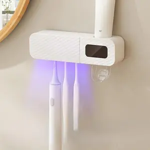 UV Toothbrush Sanitizer and Holder - A Wall-Mounted Toothbrush Storage Case with Automatic Toothpaste Dispenser and Sterilizer for Oral Hygiene and Health Toothbrush Holders