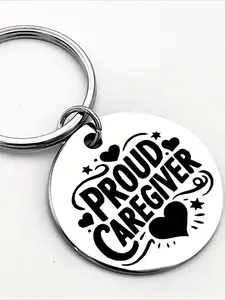 "Proud Caregiver" thanks to the stainless steel keychain, engraved with the words "PROUD CAREGIVER", heart shape and star design - perfect for nurses, assistants and caregivers gift accessories