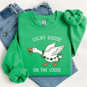 St. Patrick’s Day “Lucky Goose on the Loose” Sweatshirt, Funny Irish Clover Goose Graphic Crewneck Pullover, Green Holiday Party Outfit Gift