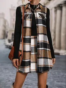 Two-piece elegant plaid vest and mini skirt set. The vest features a comfortable fabric with a button-down collar and elastic waistband. Stylish, minimalist, and versatile—a perfect everyday casual ensemble.