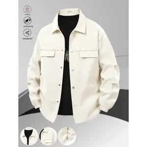 A retro workwear-style jacket with double chest pockets and metal buttons, designed for a relaxed fit—perfect for urban wanderers and outdoor explorers, offering a structured yet casual look.