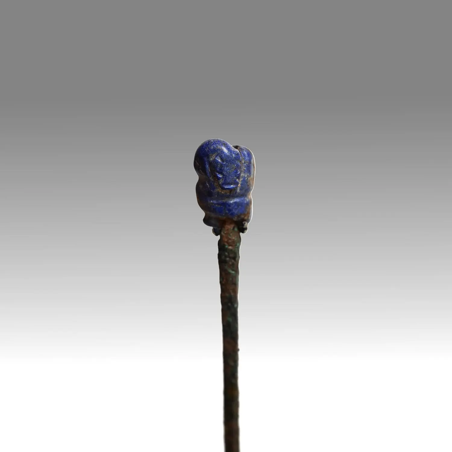 A rare Sumerian Copper Pin with Lapis Snake Finial, ca. 3rd millennium BCE