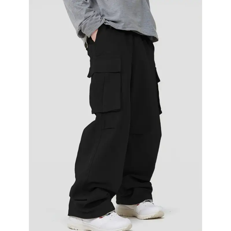 Boy's trendy cargo pants: elastic waist, flap pockets, loose casual baggy fit. Comfy, durable & on-point. #KidsCargoVibes #BoyStyle #BaggyTrend