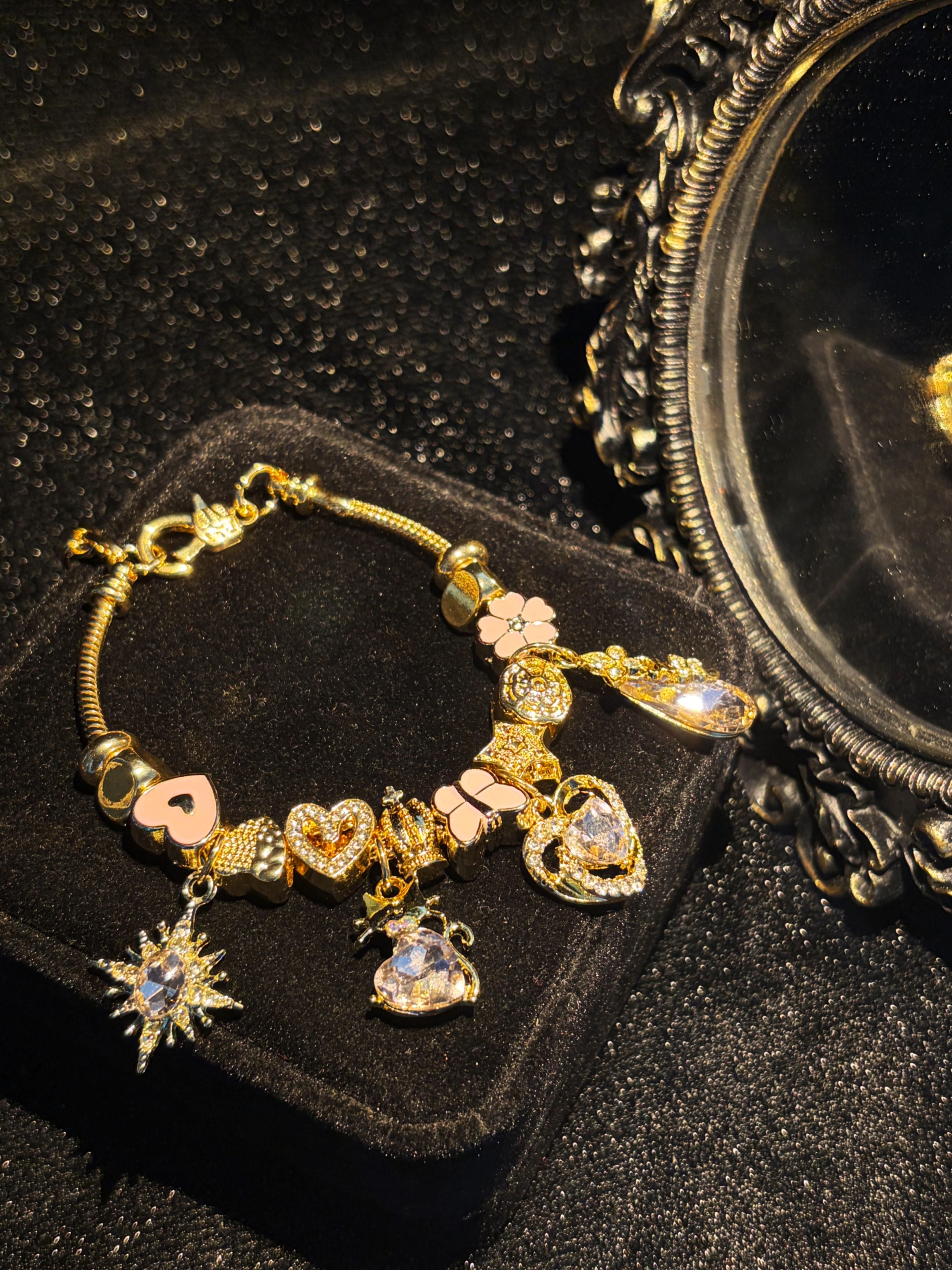 Women's Gold-Tone Adjustable Snake Chain Charm Bracelet - Pink Heart, Butterfly, Flower, Star Crystal Charms - Fashion Costume Jewelry Gift for Ladies Women's Gold-Tone Adjustable Snake Chain Charm Bracelet - Pink Heart, Butterfly, Flower, Star Crystal Charms - Fashion Costume Jewelry Gift for Ladies