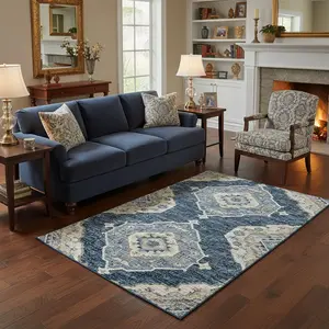 HomeRoots 644194 5 x 8 ft. Blue & Ivory Tribal Traditional Washable Machine Made Rectangle Area Rug with UV Protection