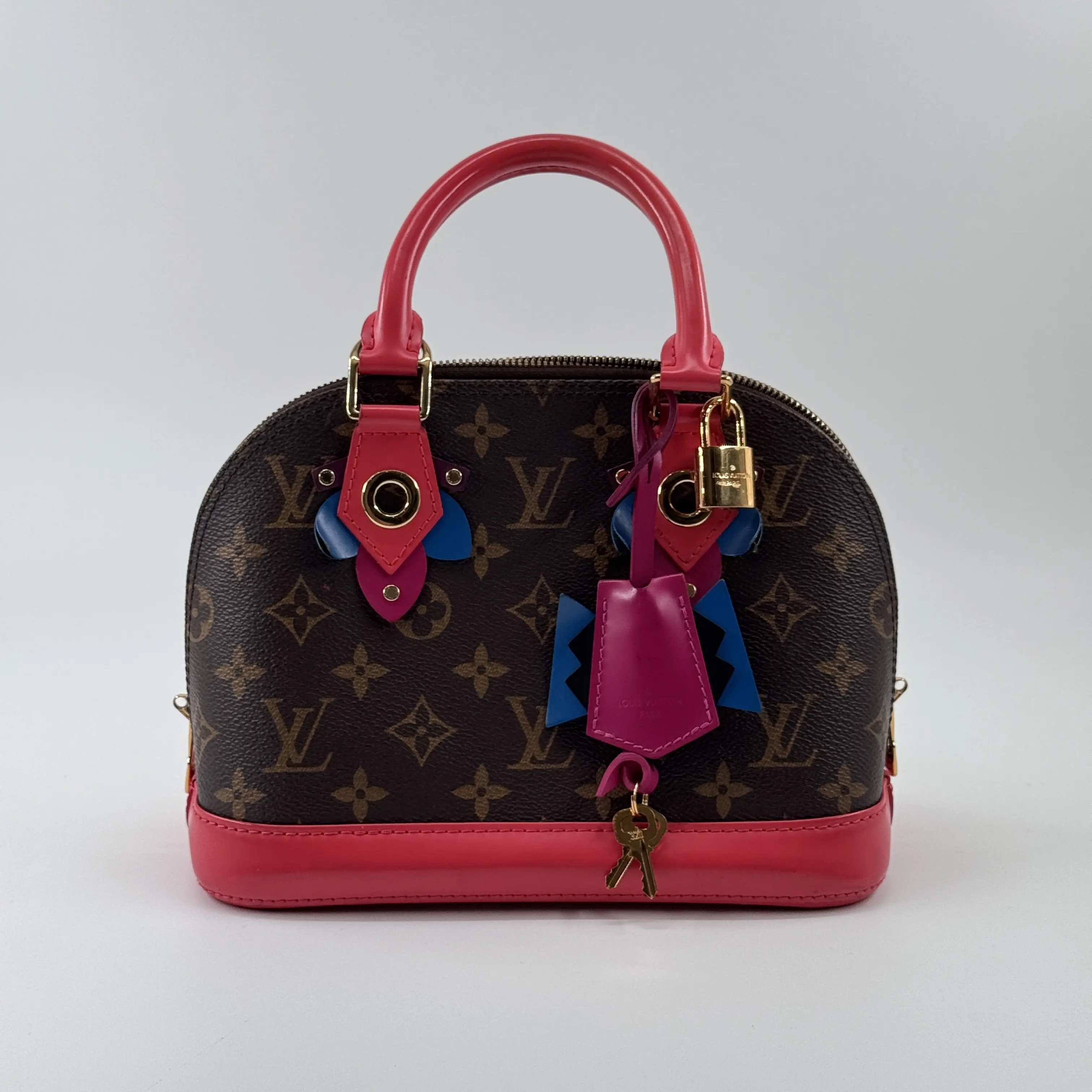 Pre-owned Louis Vuitton canvas Crossbody bags Alma BB Limited Edition Christmas Monster Tote Bag with Monogram and Red Leather Accents