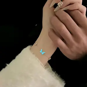 Light-Up Bracelet with Butterfly Charm Aesthetic Vibe Glow-in-the-Dark Photoluminescent Material for Night Outings Ideal for Parties Blue or Purple Glow