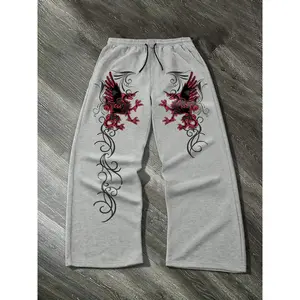 These gothic-style terror bird print sweatpants feature a soft and comfortable fabric for ultimate comfort. The stylish design is perfect for casual wear and outdoor activities.