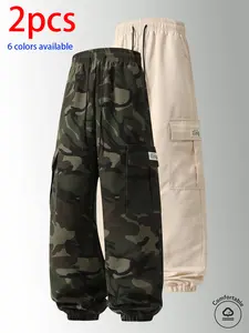 2-pack men’s long pants: camouflage cargo jogger pants with an elastic drawstring waistband and large side pockets; loose fit that doesn’t constrict the legs. Available in multiple colors; suitable for outdoor hiking and camping, everyday streetwear, shor