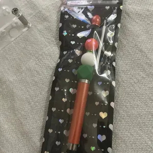 Orange & Green Stylus Pen with Heart Pattern Packaging for Easy Grip and Stylish Writing