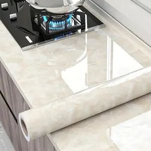 Self-adhesive marble pattern wall sticker shows natural layered texture for kitchens, bathrooms and rental spaces, creating a clean modern style.