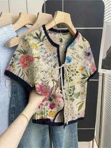 Women's khaki bohemian vacation short-sleeve knit top. Loose round neck, contrast floral print, front tie and contrast piping. Comfortable for spring & summer casual wear.
