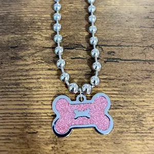 Pink Glitter Dog Bone necklace
