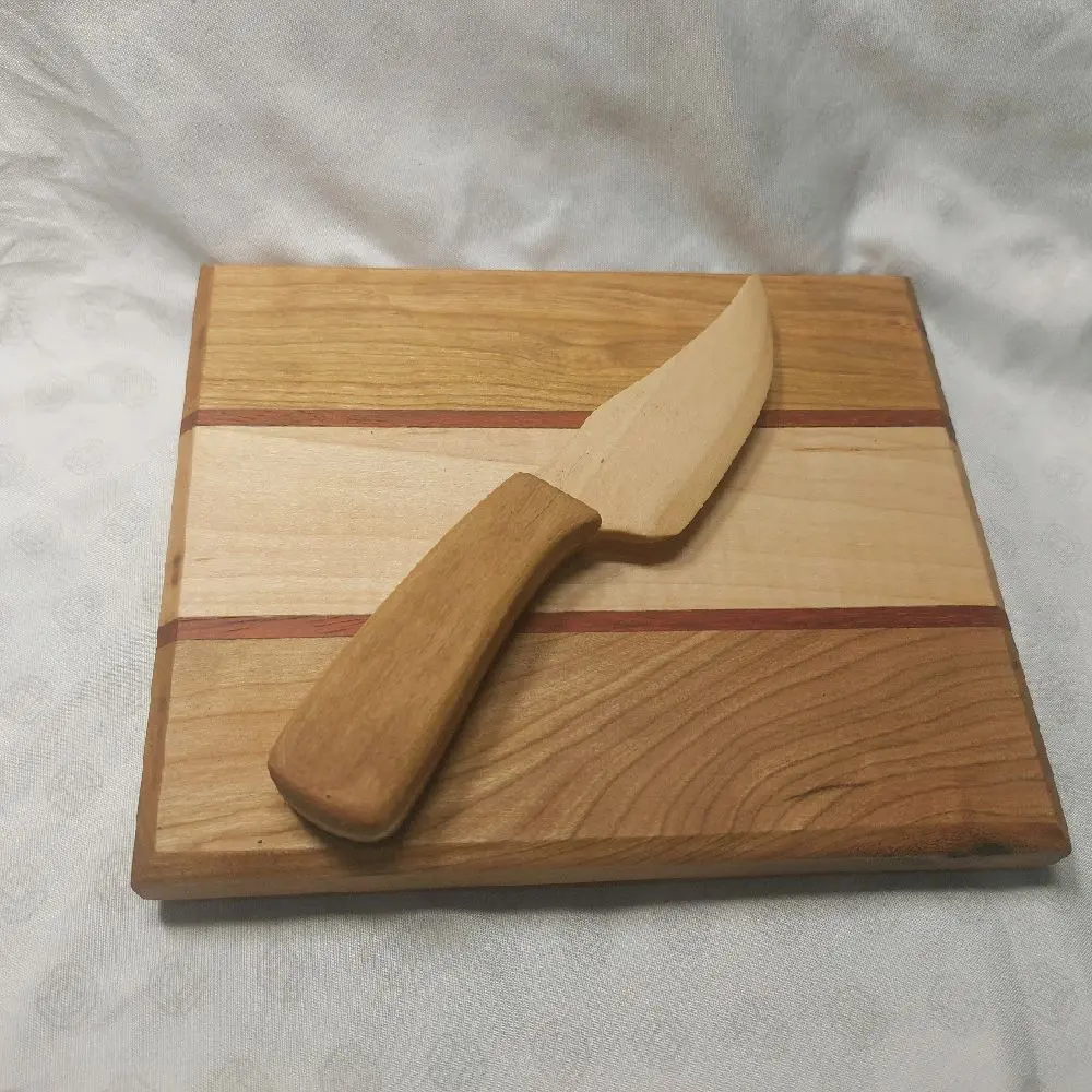 small cheese board with matching cheese knife