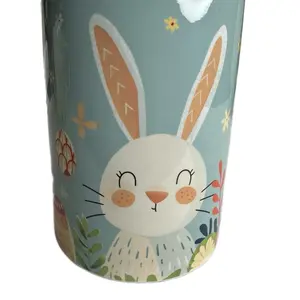 Easter Bunny coffee mug 15oz. Custom made by me. Can be personalized upon request . Good quality cricket ceramic 15oz. Sublimated image design  can be customized .