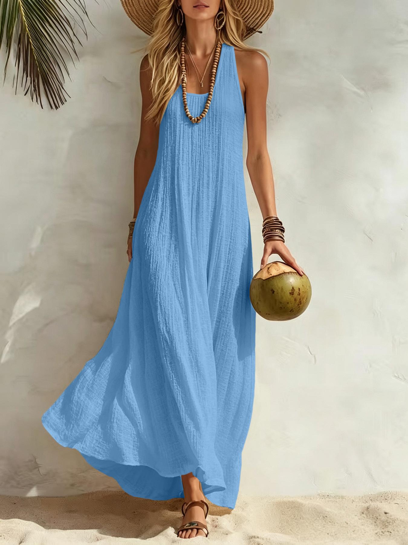 Women’s summer dress with a relaxed Bohemian beach vacation vibe—loose fit that flatters the figure and is comfortable, long length. Women’s summer dress with a relaxed Bohemian beach vacation vibe—loose fit that flatters the figure and is comfortable, long length.