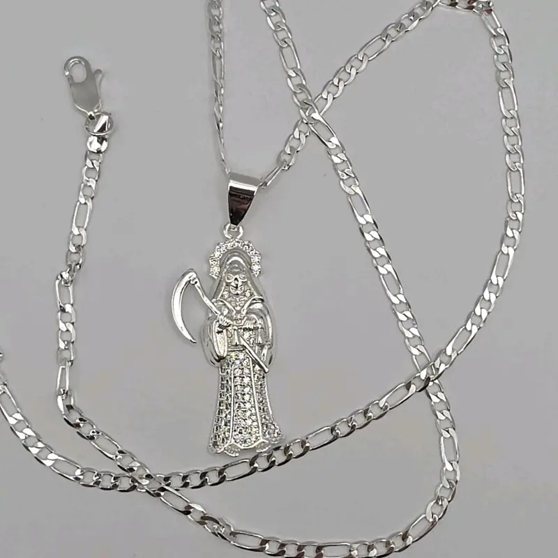 The grim reaper/La Santa Muerte gold-plated silver color with figaro chain clear stone's