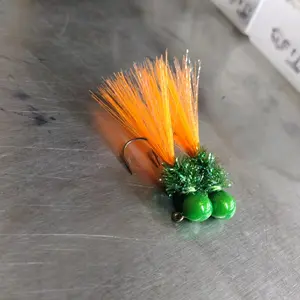 2 pack of  super glow green head glows in the dark, peacock green body, orange fishair tail with flash