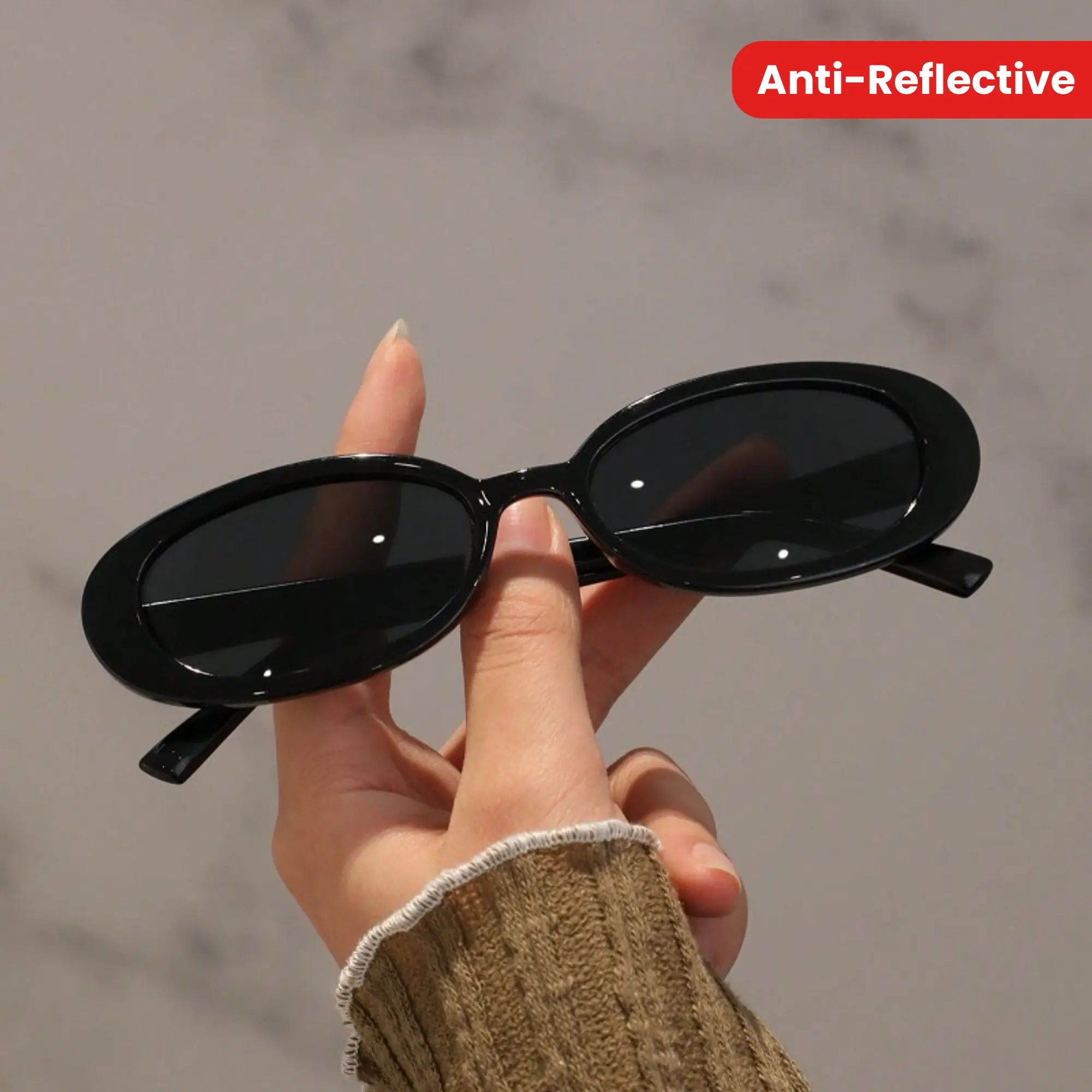 A Pair of Stylish Oval Glasses with Anti-Reflective PC Lens and Durable Plastic Frame for Everyday Wear