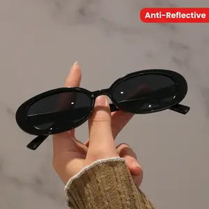 A Pair of Stylish Oval Glasses with Anti-Reflective PC Lens and Durable Plastic Frame for Everyday Wear